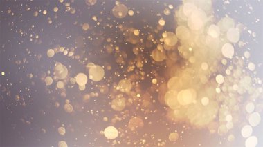 Defocused soft light and bokeh glitter lights background. Golden shimmering particles abstract bokeh glitter background iamge.