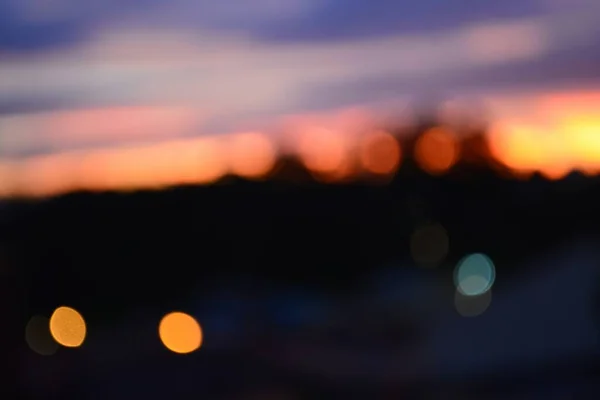  Beautiful Night Life bokeh. Everyday Night life Realistic and organic rainbow bokeh soft light background. shiny soft light bokeh abstract background overlay video. Realistic camera organic light leaks bokeh overlay background.