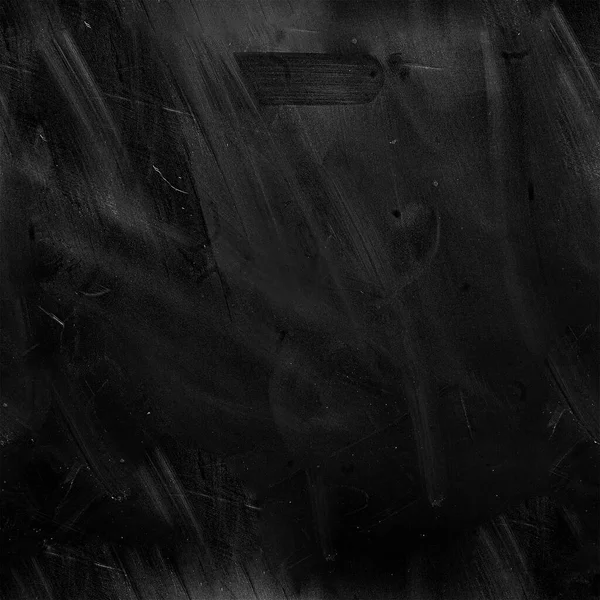 Grungy texture of brush strokes. Black background. Grunge. Chalkboard. Blackboard wallpaper. Close up retro plain dark black cement or concrete wall background texture.