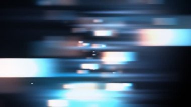 Different neon and vibrant colored assorted geometrical shapes floating over a shiny background. Soft light bokeh geometrical shape motion graphics background.