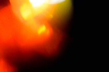 Real Lens flare light leaks overlay for photo editing. Film Texture real lens flare through glass effects for overlay. crystal light leak effect for photo overlay. Bright red orange prism lens flare bokeh.