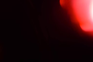 Real Lens flare light leaks overlay for photo editing. Film Texture real lens flare through glass effects for overlay. crystal light leak effect for photo overlay. Bright red orange prism lens flare bokeh.