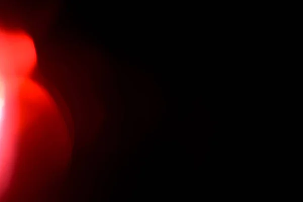 Real Lens flare light leaks overlay for photo editing. Film Texture real lens flare through glass effects for overlay. crystal light leak effect for photo overlay. Bright red orange prism lens flare bokeh.