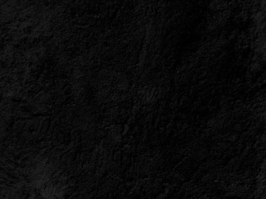  Close up retro plain dark black wall background texture. Distressed overlay texture of rusted peeled metal. Dark black grunge background.
