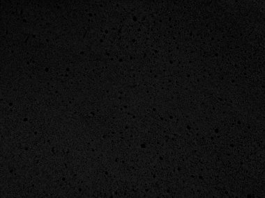 Old black background. Grunge texture. Dark wallpaper. Blackboard. Chalkboard. Concrete Wall.