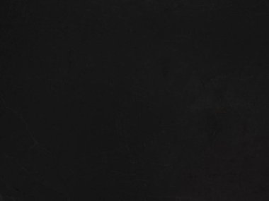 Close up retro plain dark black wall background texture. Distressed overlay texture of rusted peeled metal. Dark black grunge background.