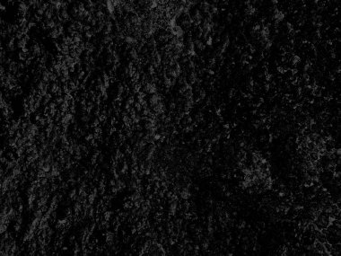 Close up retro plain dark black wall background texture. Distressed overlay texture of rusted peeled metal. Dark black grunge background.