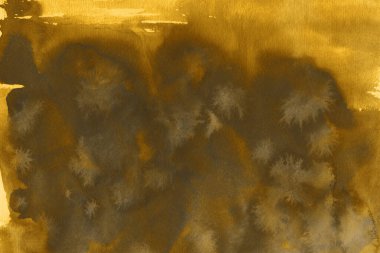 Kağıt ya da tuval üzerinde altın mürekkep dokusu. Parlak, zarif ve kaliteli altın mürekkep dokusu. Soyut sanat, ödüller, konser, sunum, grafik tasarım ve daha fazlası için arkaplan.