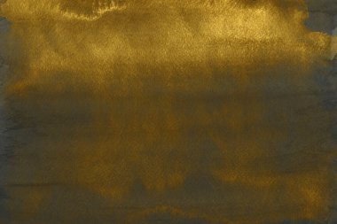 Altın Mürekkep desenli arka plan. Kağıt bir tuval üzerinde yumuşak altın su mürekkebi. Soyut altın parıltılı desenli sanat illüstrasyonu. Soyut sanat, ödüller, konser, sunum, grafik tasarımı ve daha fazlası için zemin.