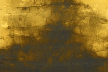 Altın Mürekkep desenli arka plan. Kağıt bir tuval üzerinde yumuşak altın su mürekkebi. Soyut altın parıltılı desenli sanat illüstrasyonu. Soyut sanat, ödüller, konser, sunum, grafik tasarımı ve daha fazlası için zemin.