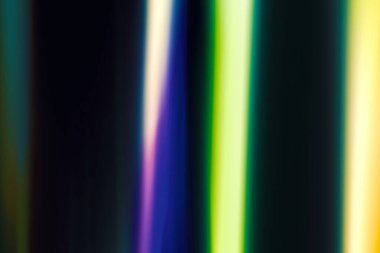 Prizma ışığı arka planda film kaplaması sızdırır. Gökkuşağı çok renkli doymuş efektli film örtüsü. Fotoğraf düzenleme için çok renkli ışık, mercek fişeği kaplamasını sızdırır. Yüksek Çözünürlüklü Mercek Işık sızıntısı Hafif Efekt Arka plan Dokusunu Örtüyor.