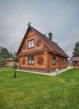 Wooden house in Dolgovo village. Minsk region. Belarus