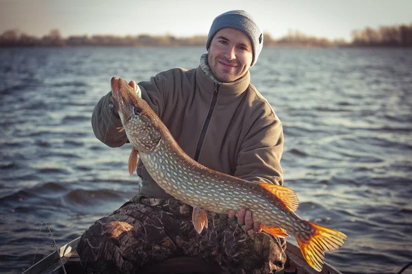 Angler with pike — Stock Photo, Image