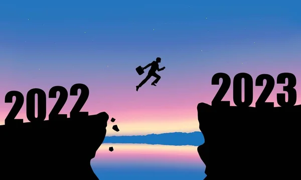 2023 Yeni Yıl Tasarımı. Bir işadamı uçurumdan atlıyor ve 2022 ile 2023 arasında atlıyor..