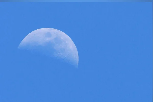 moon over blue sky, astronomy photo