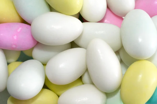 Colorful sugar-coated almond egg-shaped candy — Stock Photo, Image