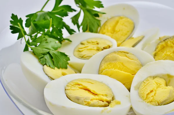 Hard boiled eggs decorated with parsly — Stock Photo, Image