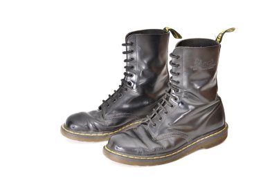 Pair of classic Dr. Martens (docs) black lace-up boots clipart