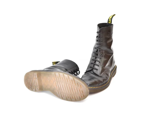 Pair of classic Dr. Martens (docs) black lace-up boots — Stock Photo, Image