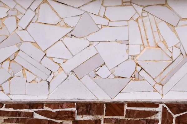 Ancient decorative mosaic from tile fragments — Stock Photo, Image