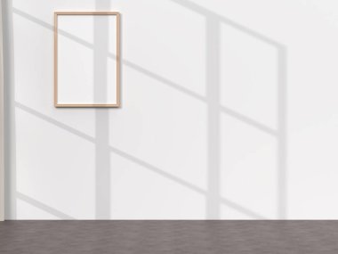 empty mockup photo frame on wall in room interior close up with window shadows.