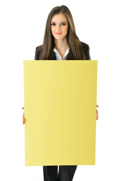 Mulher de negócios segurando uma placa amarela em branco — Fotografia de Stock