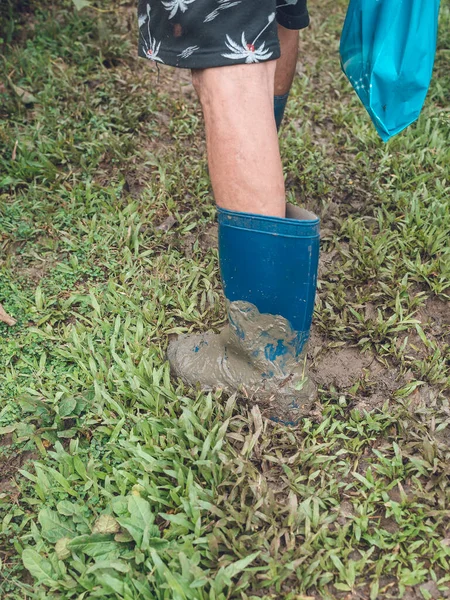Old Man Blue Rubber Boots Walks Uphill Muddy Pathway Grassy — Stock Photo, Image