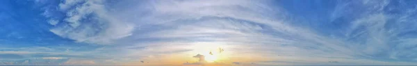 Beautiful panoramic sunset sky and clouds, Twilight cloudscape, Air clouds in the blue sky background. Abstract style for text and design.
