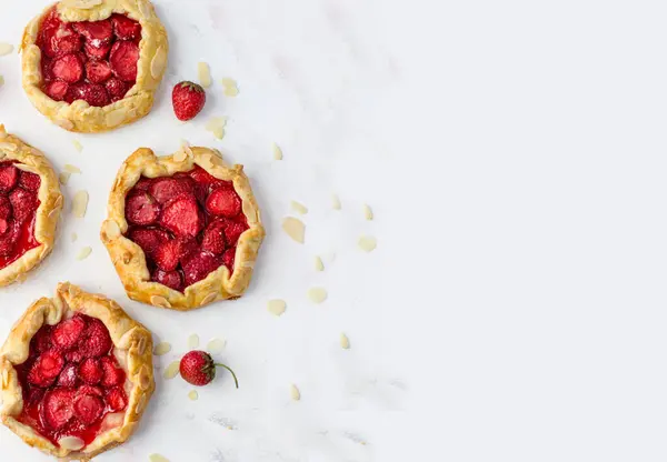 Top View Mini Biscuits Strawberries Small Pies White Background Space — Stock Photo, Image