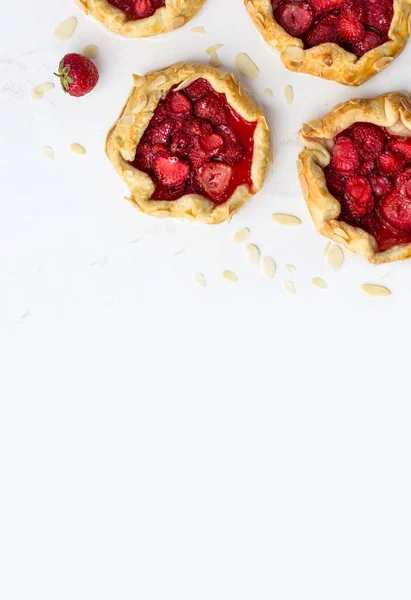 Top View Mini Biscuits Strawberries Small Pies White Background Space — Foto Stock