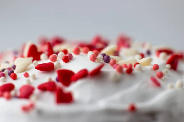 Easter decorated with white sugar glaze, red and white sugar hearts