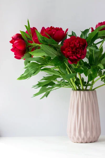 Bouquet of peonies on a white background. Beautiful summer bouquet.