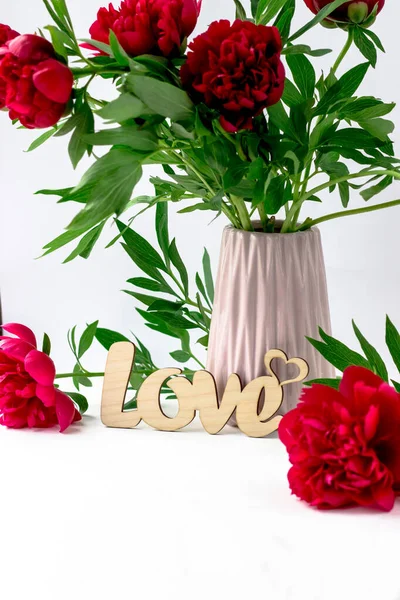 Bouquet of peonies on a white background. Beautiful summer bouquet.