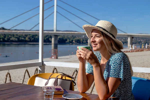 Beautiful Young Woman Wearing Straw Hat Enjoys Cup Coffee Lovely — Stok fotoğraf