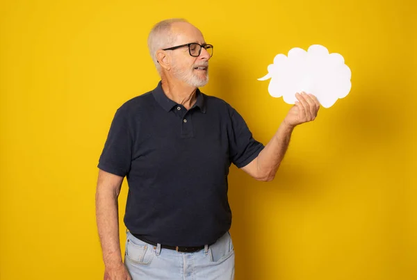 Senior Man Holding Paper Cloud Isolated Yellow Background — Stock Photo, Image