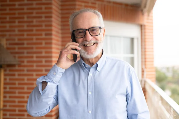 Smiling Senior Man Talking Mobile Phone Terrace Home — Fotografia de Stock