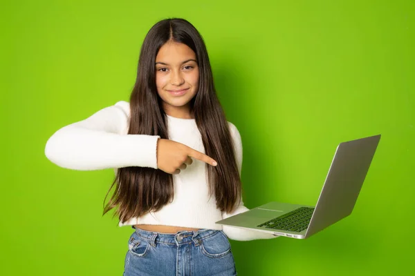Beautiful Girl Long Hair Pointing Finger Laptop Computer Green Background — Zdjęcie stockowe