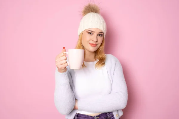 Young Woman Winter Hat Drinking Coffee Standing Isolated Pink Background — Stockfoto
