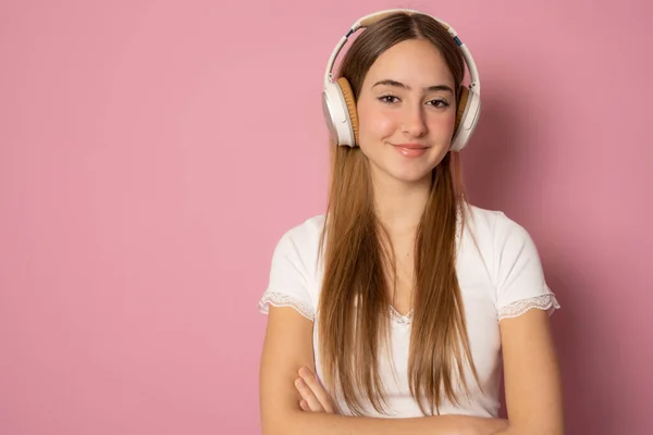 Close Portrait Smiling Young Woman Wearing Headphones Pink Background — стоковое фото