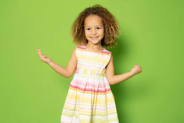 Beautiful Little Girl Curly Hair Posing Isolated Green Background — Stock Photo, Image
