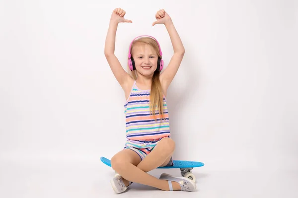 Smiling Little Sports Girl Playing Skateboard Isolated White Background — стоковое фото