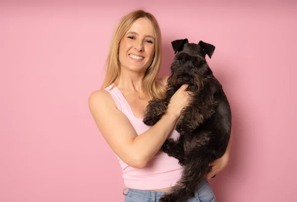 Cute Young Woman Hugs Her Puppy Schnauzer Dog Love Owner — ストック写真