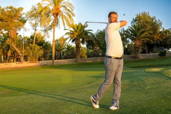 Good Strike Golfer Swinging His Driver Looking Away While Standing — Photo
