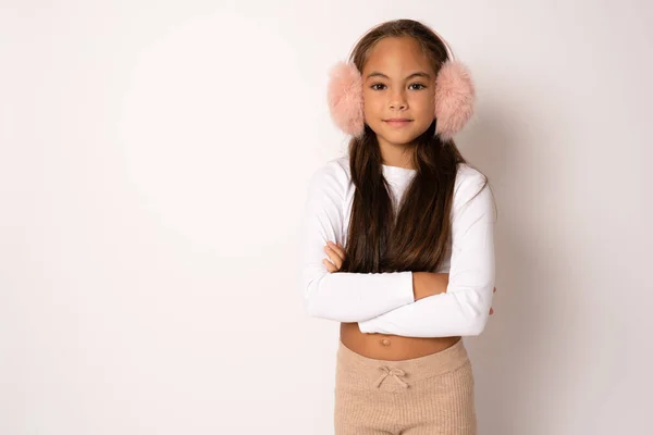 Cute Girl Wearing Stylish Earmuffs Standing Arms Folded White Background — Stock Photo, Image