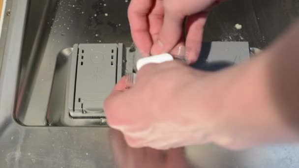 Insert detergent tablet to the dishwasher (opening for tablet) — Stock Video