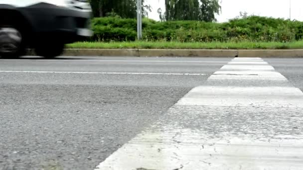 Cars drive on the road - detail of road — Stock Video