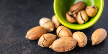 Masada fındık fıstığı var. Fotokopi, uzay yemeği arka plan, kırsal vejetaryen yemeği.