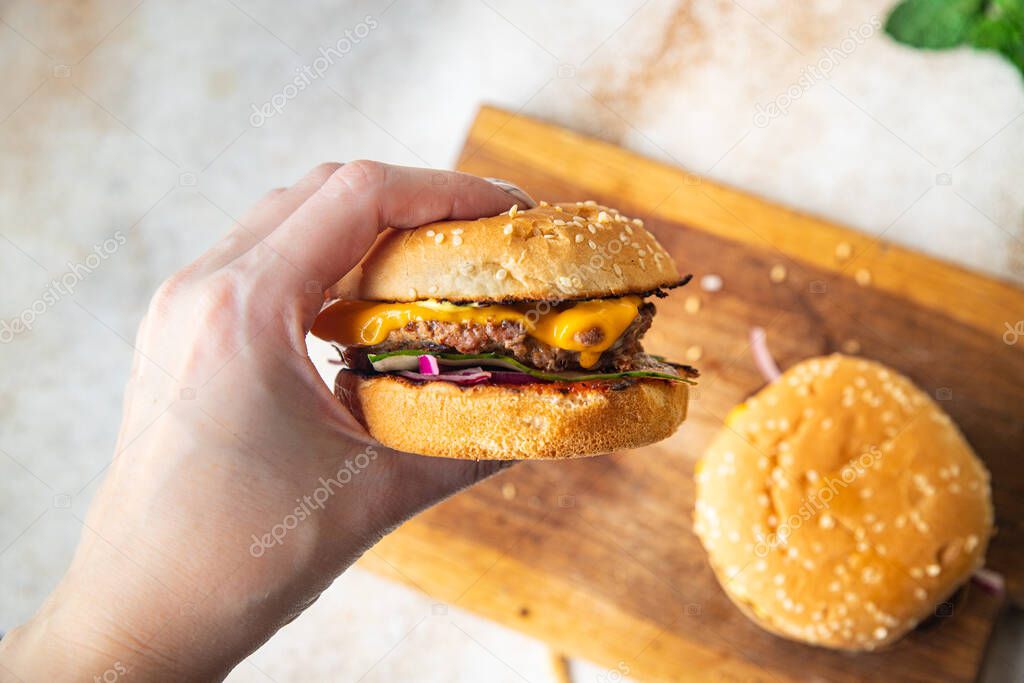 cheeseburger burger homemade bun, cheese, vegetable, grilled cutlet minced meat pork, beef fast food meal snack copy space food background rustic 