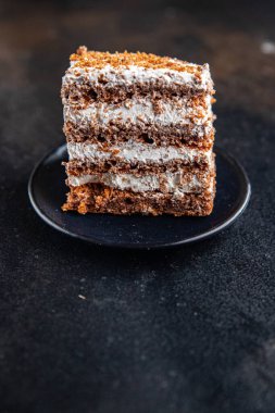 Bisküvi kremalı vanilya katmanları tatlı tatlı yemek atıştırmalığı masa fotokopisi arka plan kırsalında. en üstteki görünüm