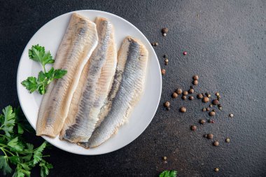 Ringa balığı fileto taze deniz ürünleri atıştırmalığı fotokopi masasında.